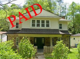 Tracy Adkins Dave Ramsey pay off mortgage - house with paid stamped in front