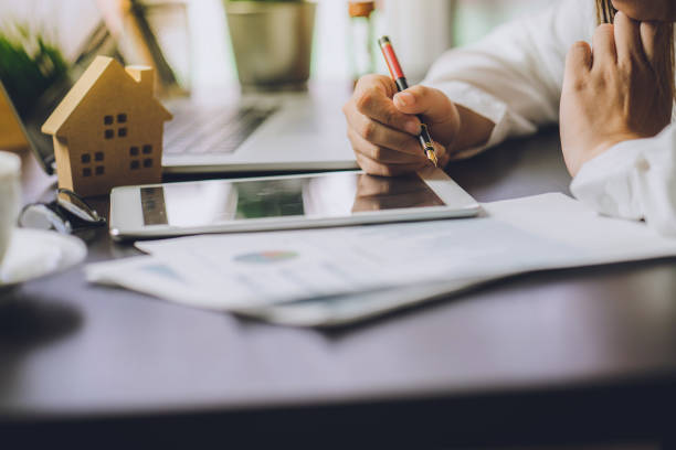 man working on estate planning using accounting tools and a tablet